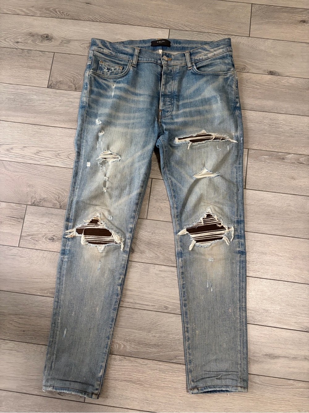 AMIRI Light Blue Ripped Skinny Jeans